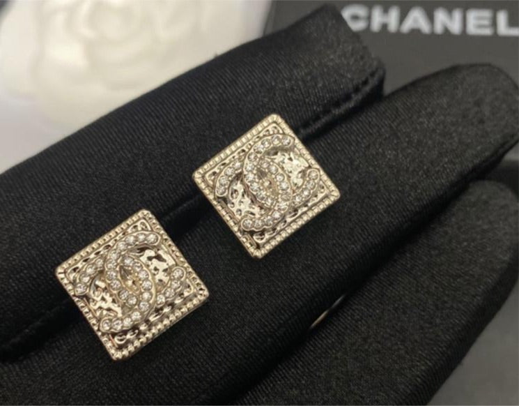 Silver Chanel studs